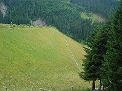 Durlaßboden Speichersee Staudamm Luftseite.JPG